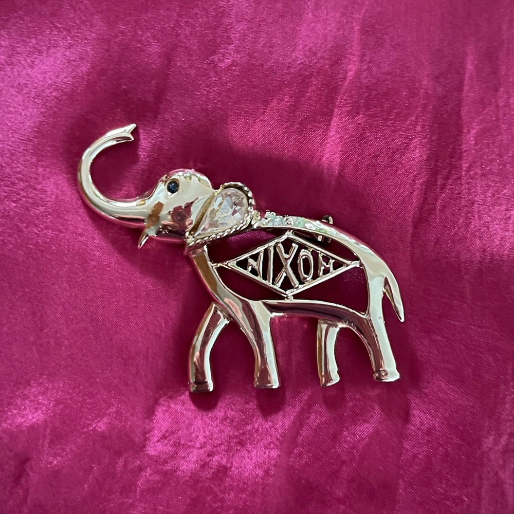 Vintage Oleet goldtone “Nixon” campaign elephant GOP brooch with rhinestones